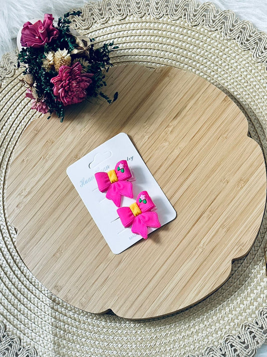88 - Duo barrettes noeud fuchsia