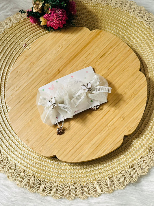 114 - Duo de barrettes Ivory